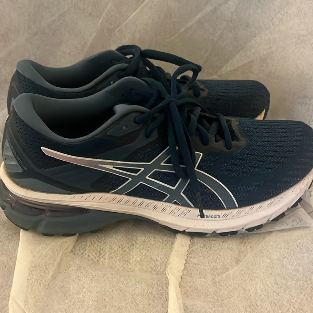 Teal ASICS running shoes